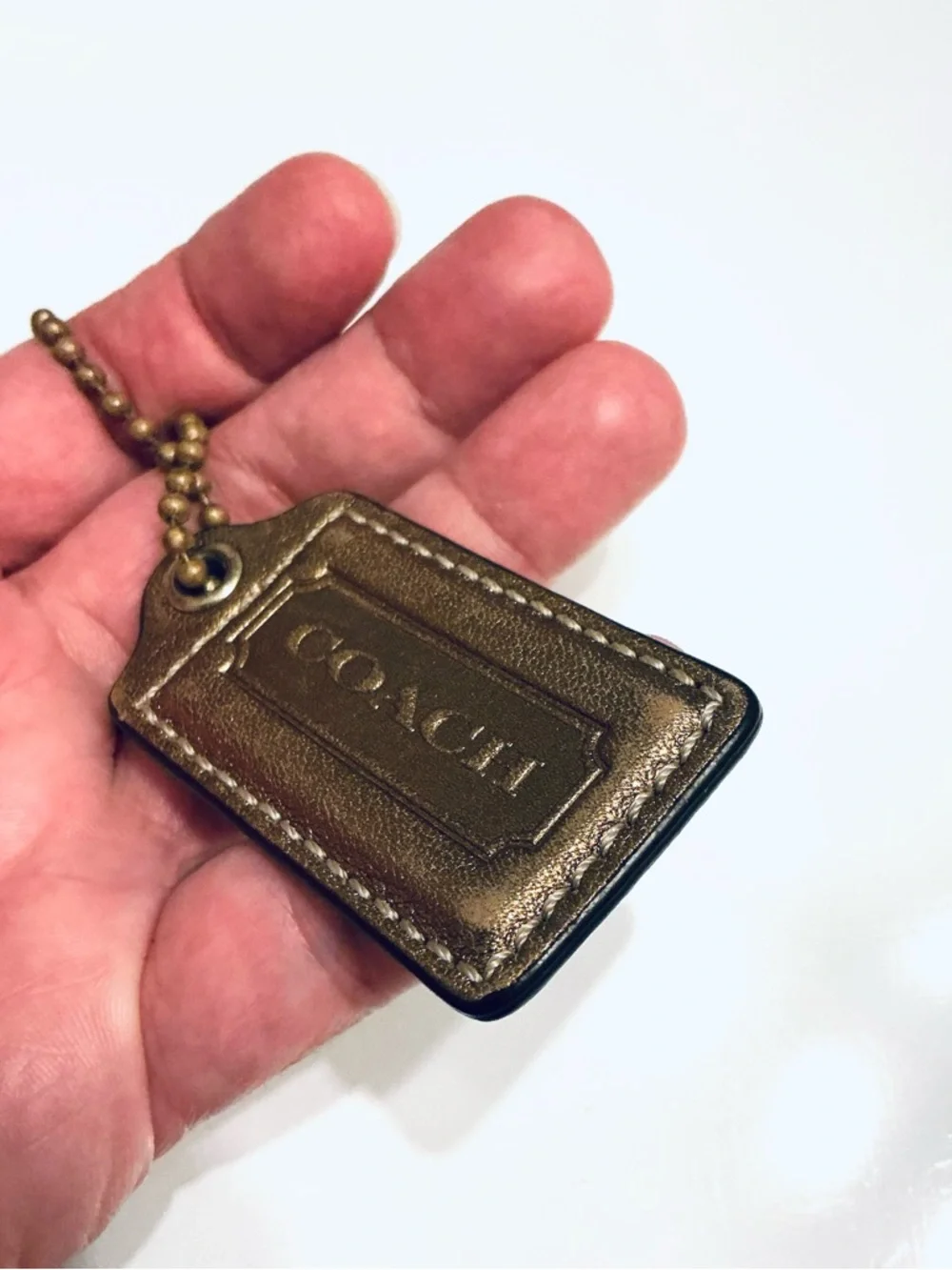 COACH Metallic Bronze, Gold Finish Replacement Hang Tag Bag Charm Fob